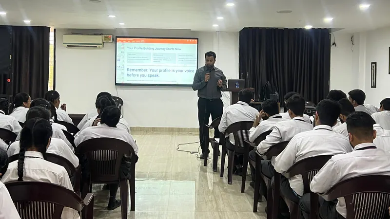 Students seated facing Anshul Wadhwa and a presentation screen