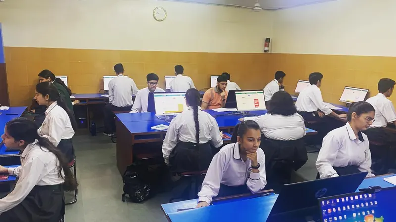 Students seated at computers