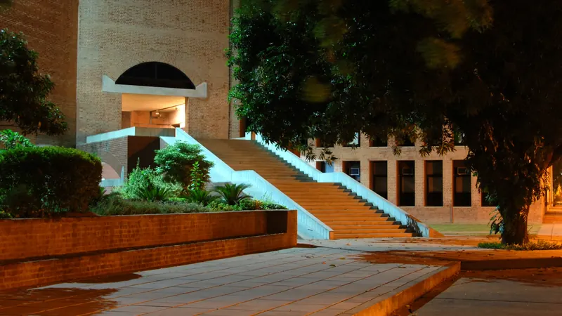 Brick steps and landscaped terraces outside buildings at IIM Ahmedabad