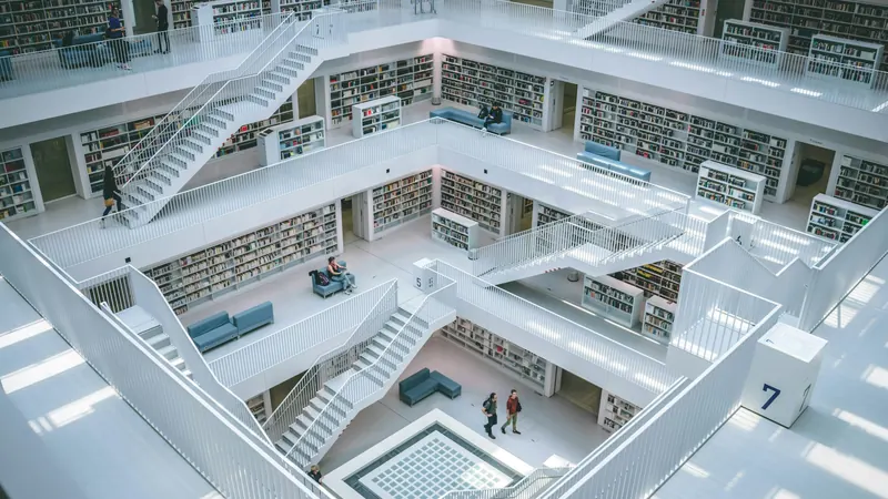 White library terraces and stairways surrounding an open central atrium